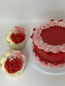 Red valentines cake with ribbons