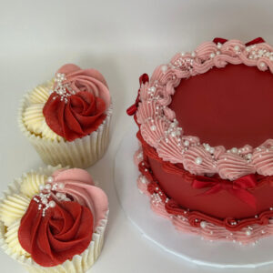 Red valentines cake with ribbons
